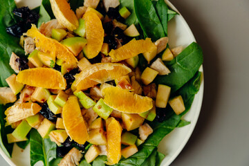 Healthy salad on a plate, top view. Menu for cafes, restaurants, dinner at home
