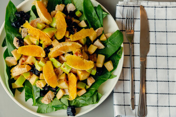 Healthy salad on a plate, top view. Menu for cafes, restaurants, dinner at home