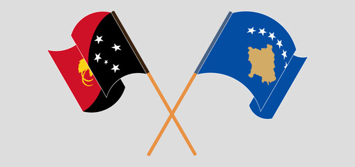 Crossed and waving flags of Papua New Guinea and Kosovo