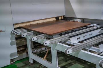 Automatic drilling and milling machine in the process of manufacturing bed and furniture factory. at South Korea.