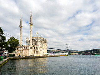 Fototapeta na wymiar Ortakoy Mosque and Bosphorus bridge in Istanbul Turkey
