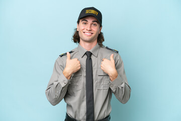 Young safeguard man isolated on blue background with surprise facial expression