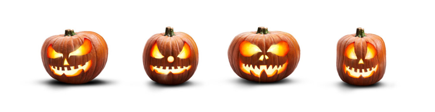 A collection of lit spooky halloween pumpkins, Jack O Lantern with evil face and eyes isolated against a transparent background.