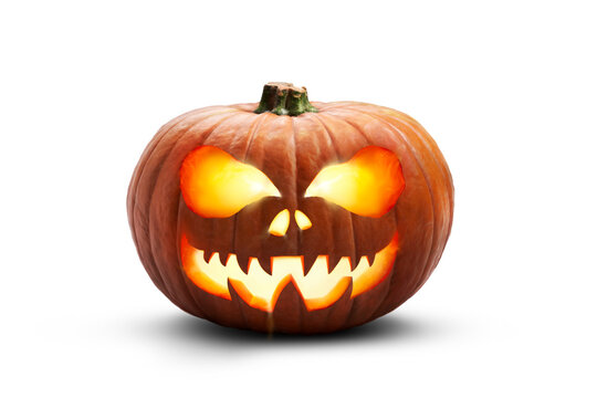 A single lit spooky halloween pumpkins, Jack O Lantern with evil face and eyes isolated against a transparent background.