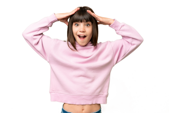 Little girl over isolated green chroma key background with surprise expression