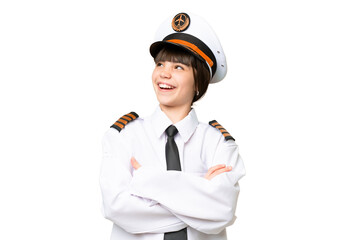Little girl as a Airplane pilot over isolated chroma key background happy and smiling