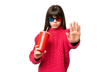 Little girl holding soda over isolated chroma key background making stop gesture