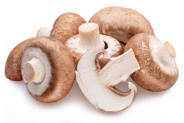 Brown cap champignons or agaricus mushrooms isolated on white background. Close-up.