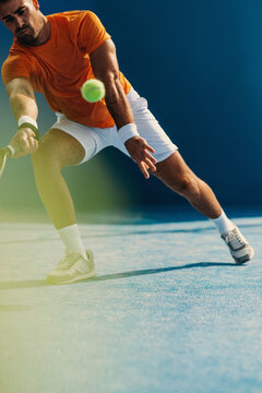 Dynamic athlete playing powerful padel strokes in a thrilling game