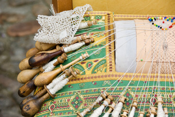 Beautiful laces manufactured handcrafted with lace pillow and its accessories.