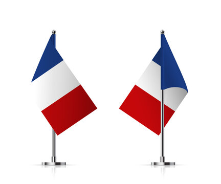 Flags of France on pole vector illustration. 3D realistic flagpoles on mini steel vertical stands, isolated desktop flagstaff, blue, white and red french flags with stripes on metal sticks