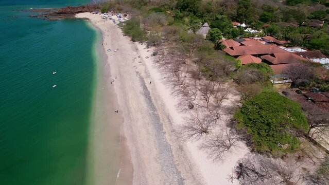 Aerial Drone Flyover Tropical Conchal Beach With Turquoise Water, Costa Rica 4K