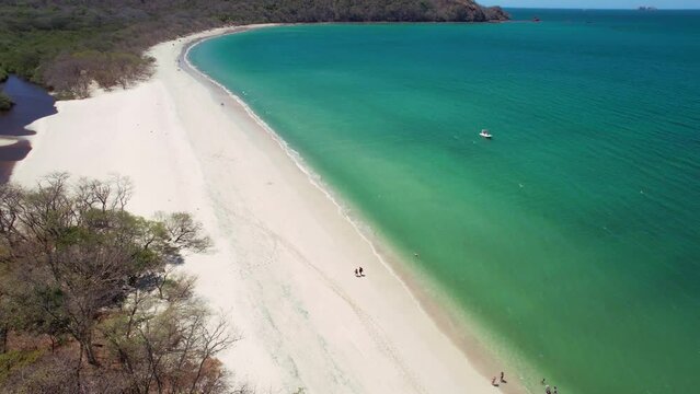 Aerial Drone Over Popular Conchal Beach Costa Rica With Inland Lake, 4K 