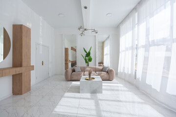 light luxury interior design of a modern apartment in a minimalist style with marble trim and huge windows. daylight inside the kitchen and living room