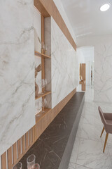 light luxury interior design of a modern apartment in a minimalist style with marble trim and huge windows. daylight inside the kitchen and living room