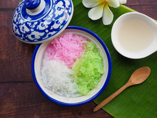 Thai dessert called Salim,  is Sweet-Bean noodles in coconut milk syrup served with ice at top view 