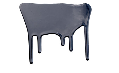 Paint drops flowing down on white paper. Black ink blots abstract background