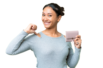 Young Uruguayan woman holding a wallet over isolated chroma key background proud and self-satisfied