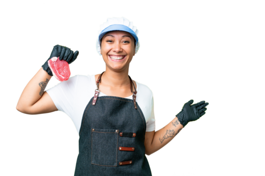 Butcher woman wearing an apron and serving fresh cut meat over isolated chroma key background extending hands to the side for inviting to come