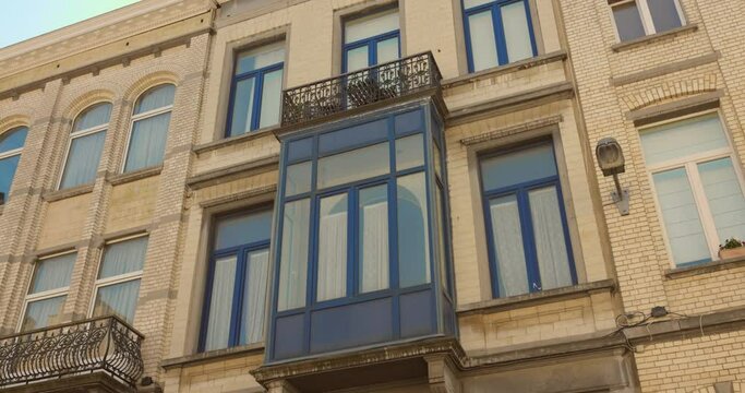 Traditional Bow Window On The Facade Of Architecture In Brussels, Belgium. Low Angle