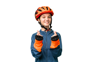 Teenager cyclist girl over isolated chroma key background making money gesture