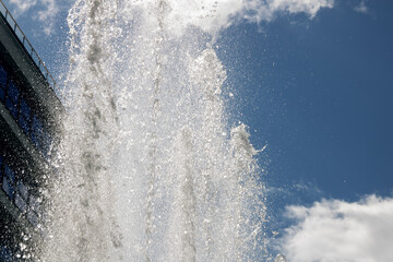 High jets of water fountain in the city