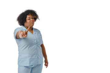 young Afro-Latin female doctor saying no with finger in front, white background with copy space