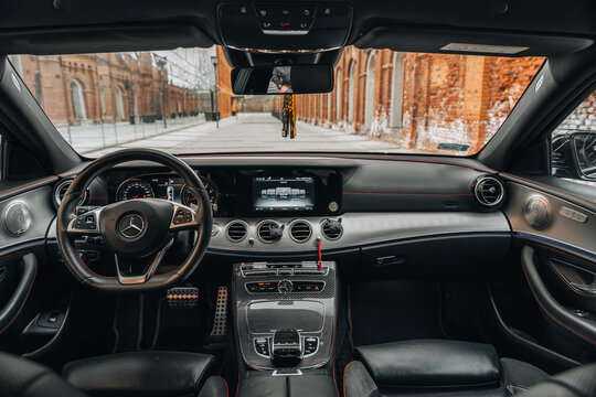 Photo of a Mercedes W213 AMG in an industrial site.
Interior, cockpit, steering wheel.