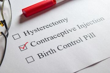 Woman's preference on birth control is contraceptive injection. Selective focus.