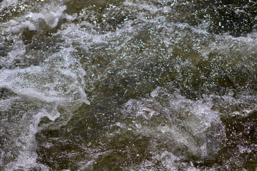 Fototapeta na wymiar water flowing into the river