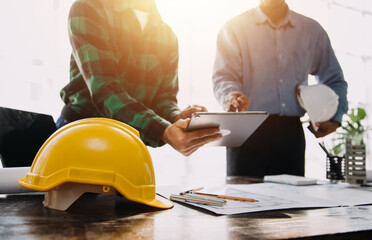 Engineer Teamwork Meeting, Drawing working on blueprint meeting for project working with partner on model building and engineering tools in working site, Construction and structure concept.