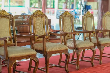Luxurious wooden chairs for special guests