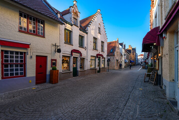 Old cozy street in Bruges (Brugge), Belgium. Cityscape of Bruges. Typical architecture of Bruges