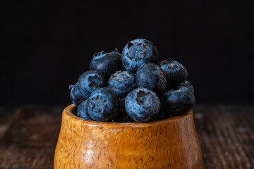 blueberries in a wooden bowl