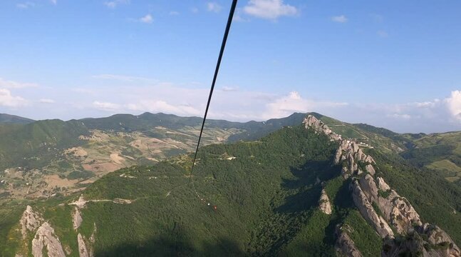 Flight of the angel, Pietrapertosa, Italy. Village nestled in the Lucanian Dolomites in Italy. Surrounded by rocks near Castelmezzano. The zipline flies between these peaks over a stunning panorama