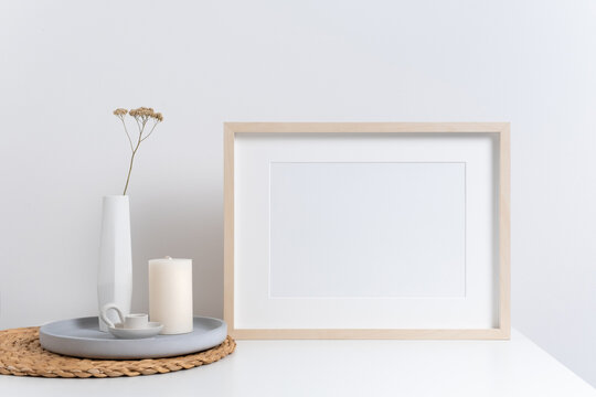 White landscape frame mockup with passepartout, copy space for design, minimalistic interior