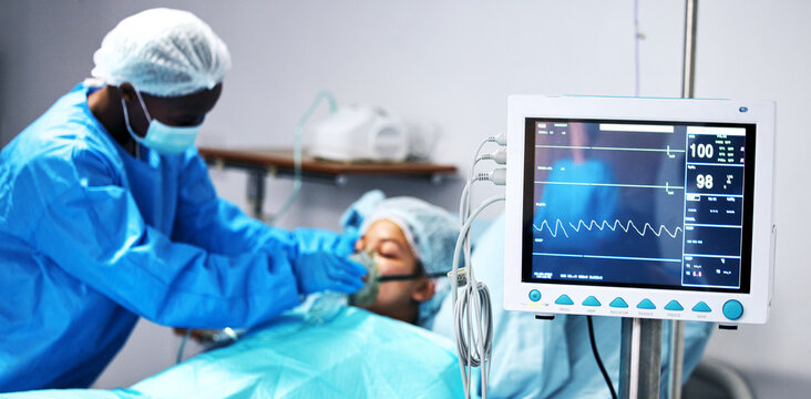 Healthcare, doctor and patient in oxygen mask with monitor for surgery, emergency care and hospital. Breathing, screen and surgeon helping person in operation, digital graphs to check medical results