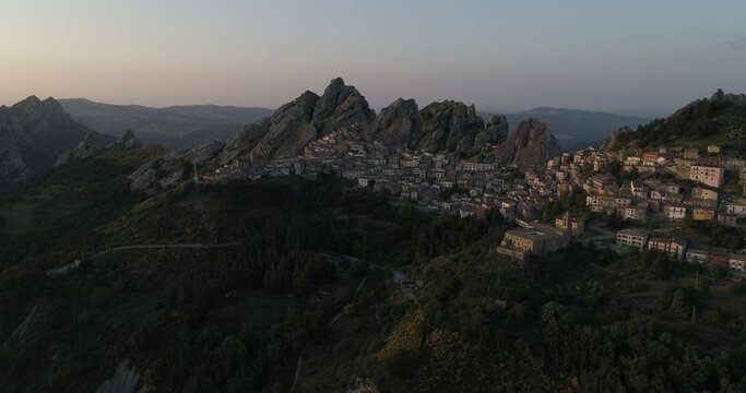 Aerial drone view in Pietrapertosa, Italy. Village nestled in the Lucanian Dolomites in Italy. Surrounded by rocks near the village of Castelmezzano. The zipline flies over a stunning panorama.