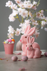 pink Ester bunny decor eggs candy flowers holiday concept