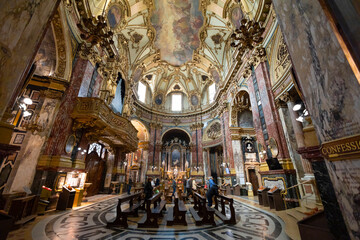 Naklejka premium TURIN, ITALY, APRIL 11, 2023 - The inner of The Sanctuary of Consolata in Turin (Torino), Piedmont, Italy