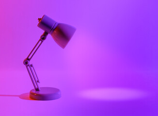 Bright pink background with a table lamp with the light on. Mocap. Bright neon background.