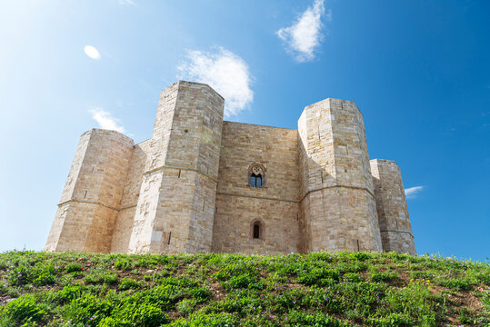 View from below of the octagonal white castle of Castel del Monte, UNESCO World Heritage Site, Apulia