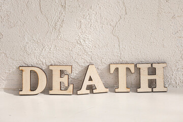 DEATH text on ivory floor for your desing.