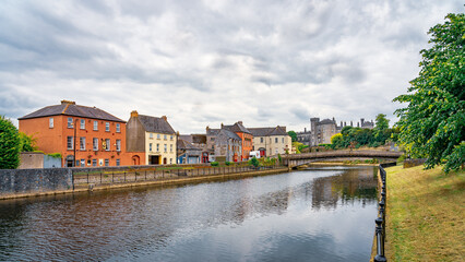 Kilkenny, Ireland - Houses on the bank of river Nore - obrazy, fototapety, plakaty