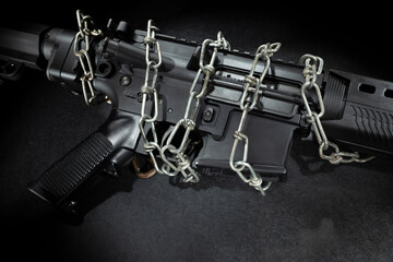 AR-15 chained up by regulations