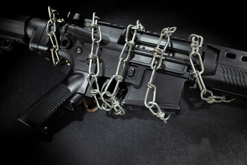 Fototapeta premium AR-15 chained up by regulations