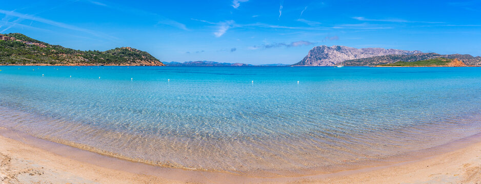 View of Capo Coda Cavallo beach and Isola di Tavolara in the background, Sardinia