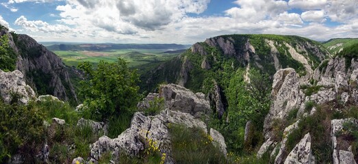Large stone valley. Steep slopes of Zadielska ravine, view to canyon in Zadiel valley Slovensky Kras National Park  - obrazy, fototapety, plakaty