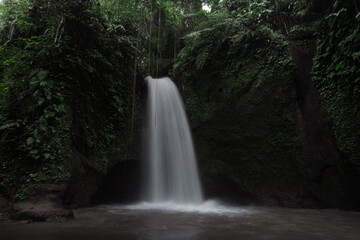 Fototapeta na wymiar Tropical waterfall in Bali, Indonesia