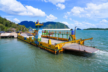 Naklejka premium Ferry moored at Hua Hin pier on Ko Lanta Noi before crossing to the island of Ko Lanta Yai in the Andaman Sea, Krabi Province, Thailand